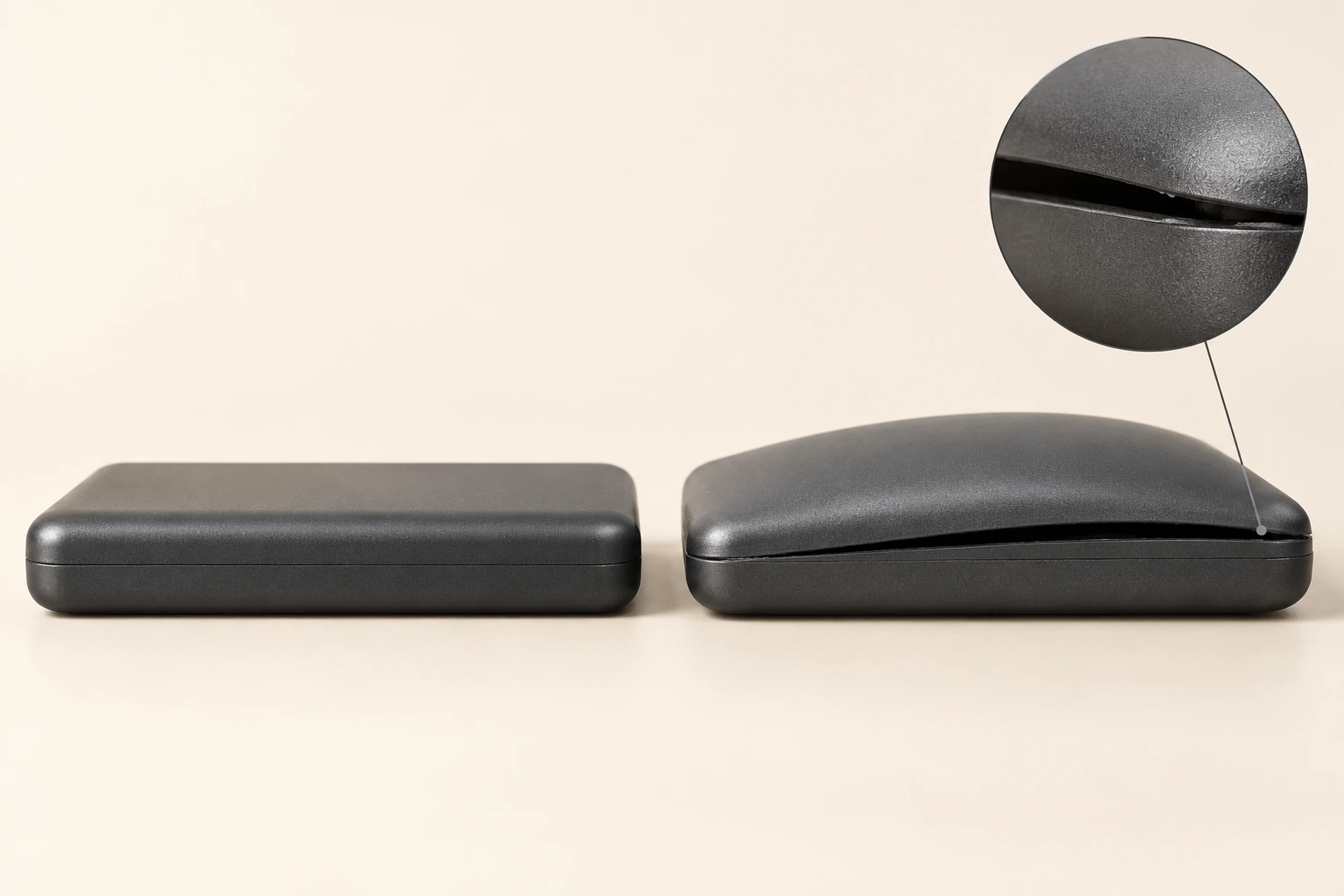 Two disconnected power banks in side profile, one with a flat shell and one with an outward bulge and opening case seam; inset enlarges the seam.